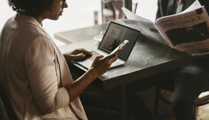 Woman checking phone for call reminder