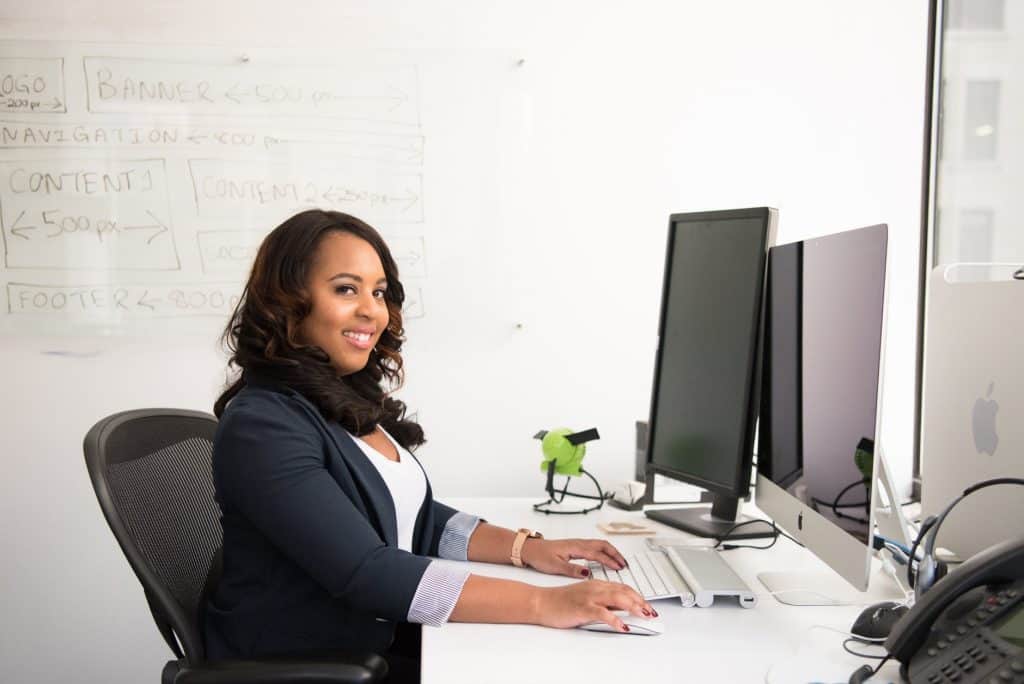 A personal assistant hard at work at her desk.