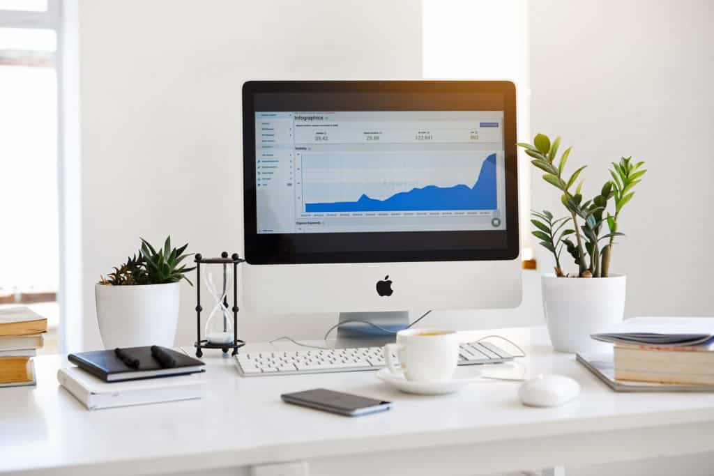 A very organized desk for a productive worker. 