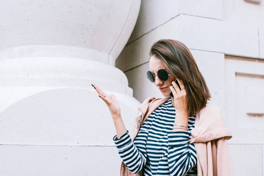 A young trendy woman on the phone