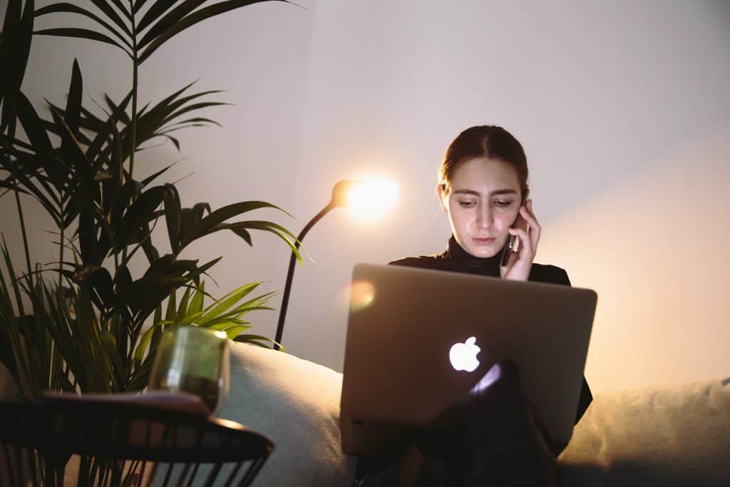 A woman on the phone in her living room