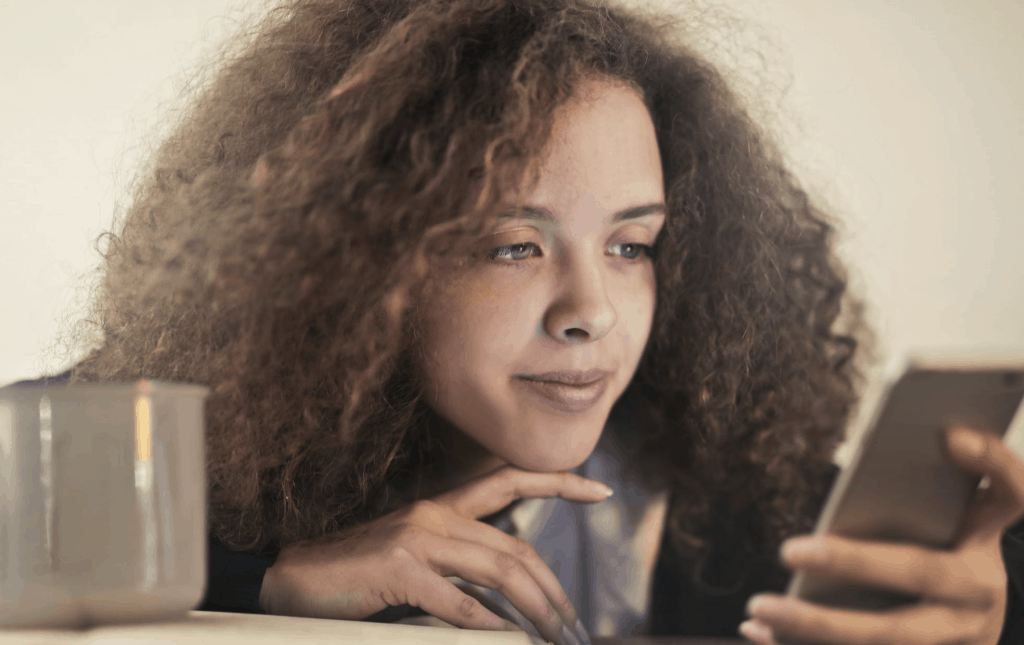 A woman looking at her phone