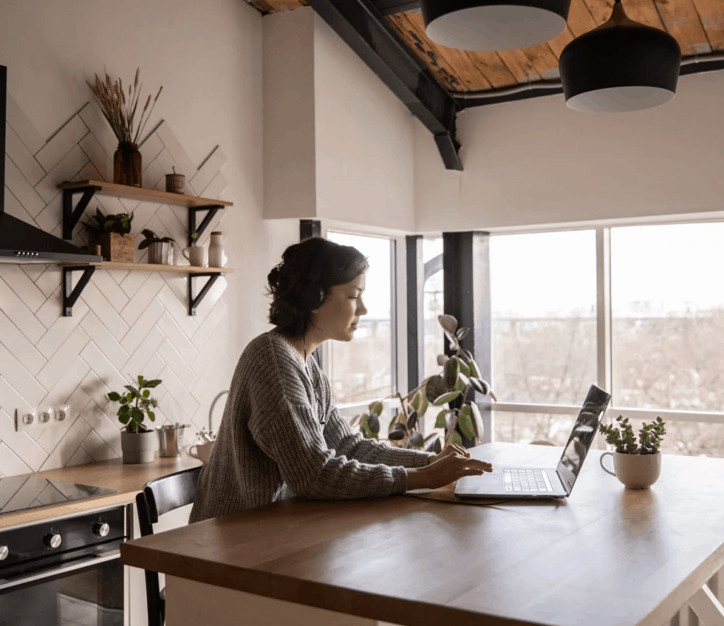 A woman working from her kitchen