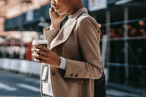 A woman speaking on the phone with Caller ID