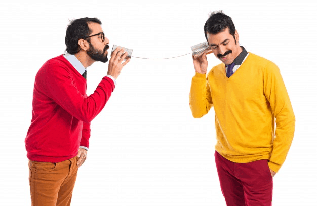 Twin brothers communicating with each other through tin cans 