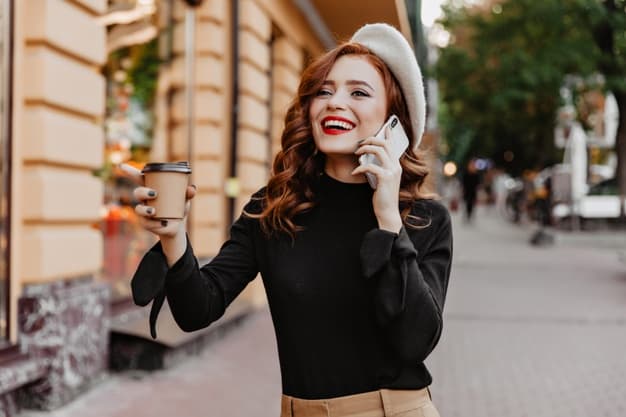 A young trendy woman speaking on the phone  